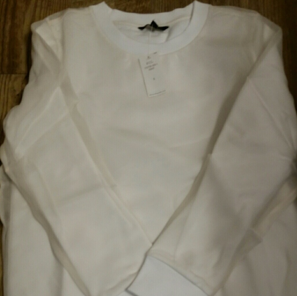 Banana Republic sweater with sheer overlay.